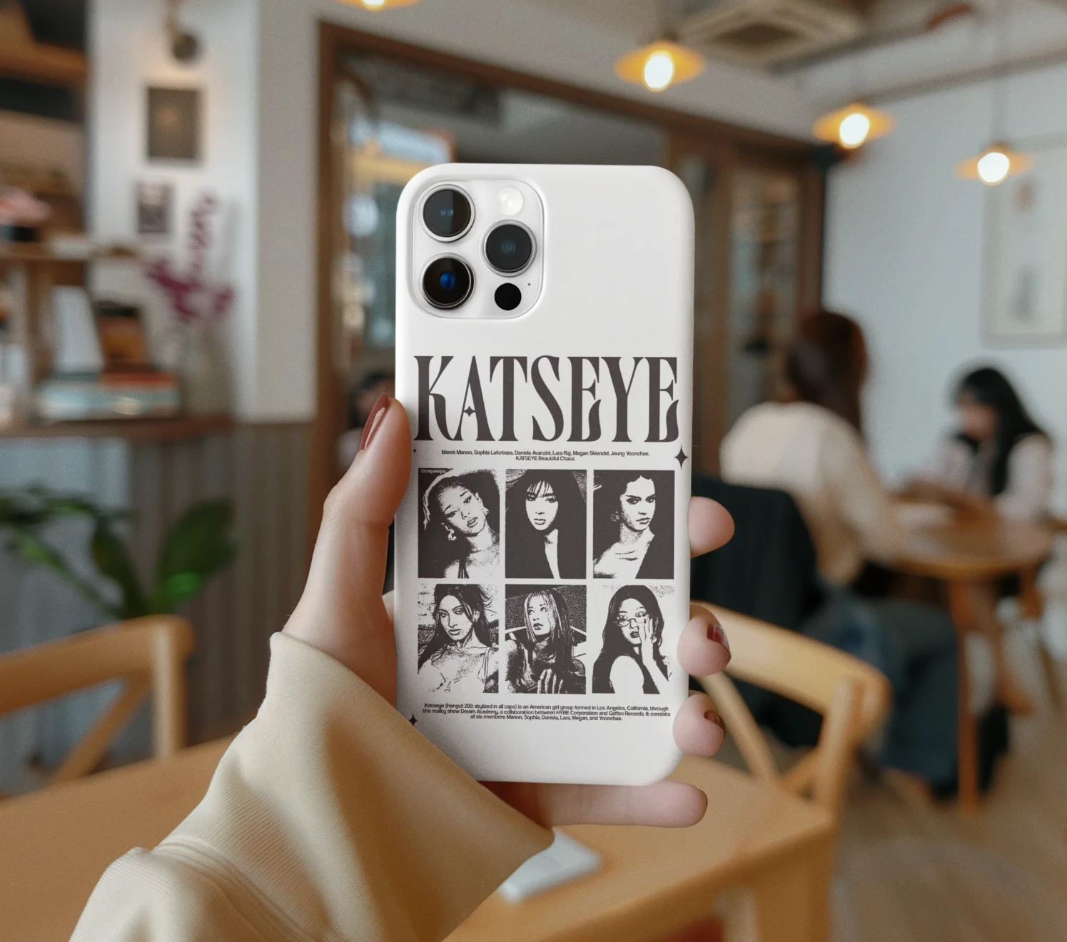 model holding Katseye Phone Case featuring band members in a coffee shop